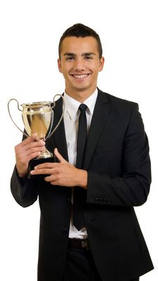 man with 
trophy